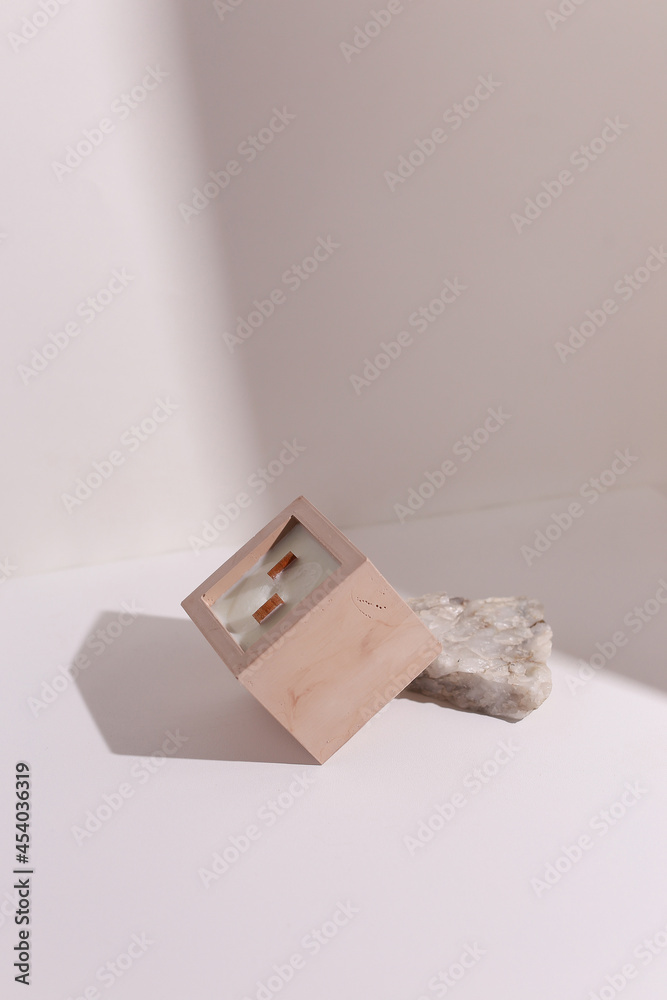 scented candles on off white background in rock holder scented candles on off white background in rock holder
