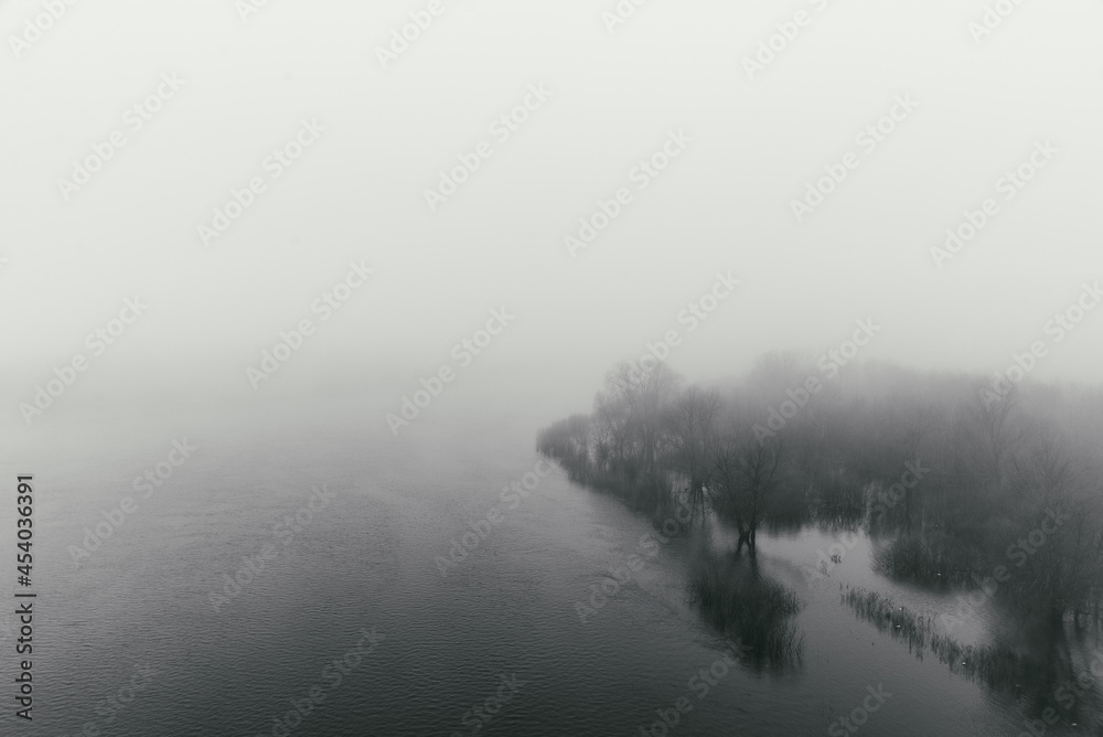 The river is in a fog.Spring flood.
