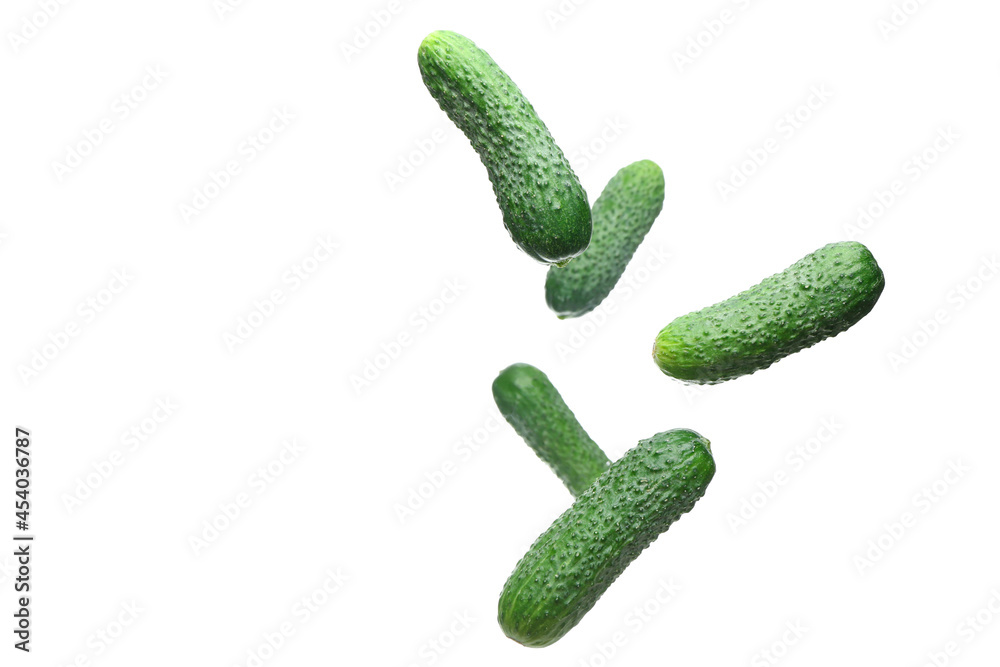 Flying cucumbers on white background Flying cucumbers on white background
