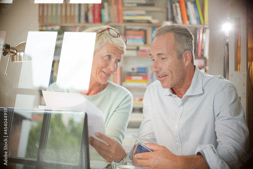 Business people working together at home office desk Business people working together at home office desk