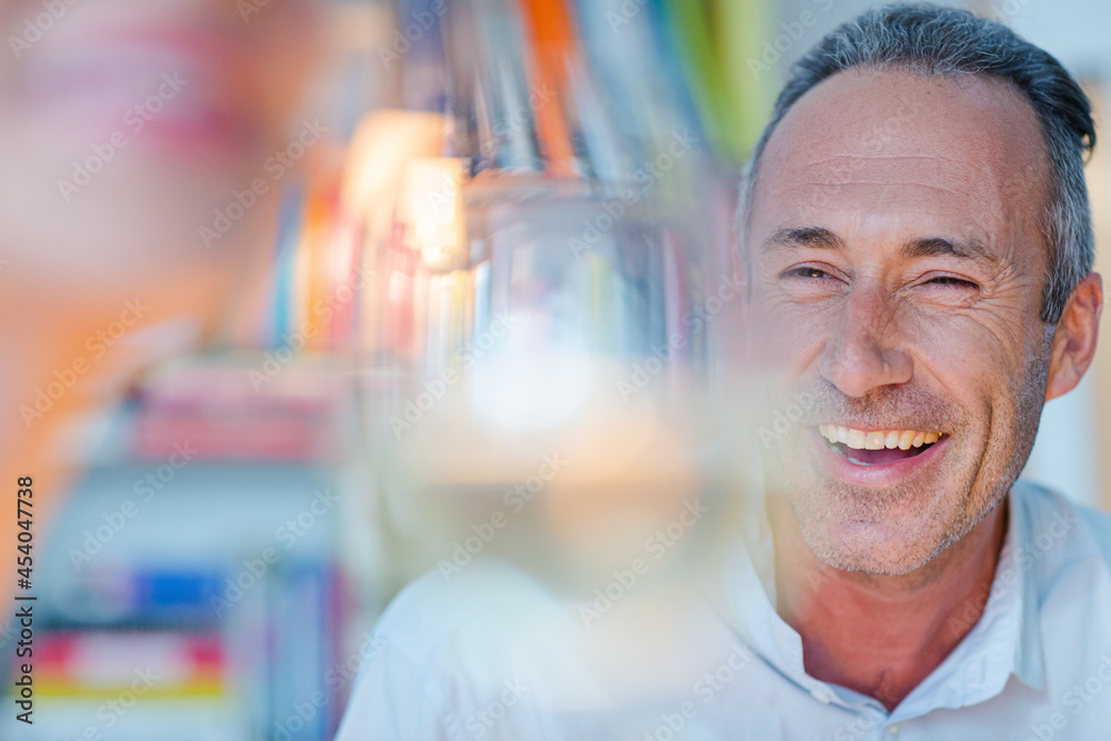 Older man smiling at wife Older man smiling at wife