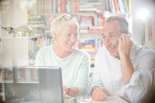 Business people working together at home office desk