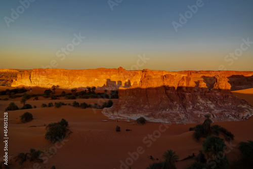 Sunrise at sandstone formation in the Sahara desert near Yoa Lake group of Ounianga Kebir, Ennedi, Chad