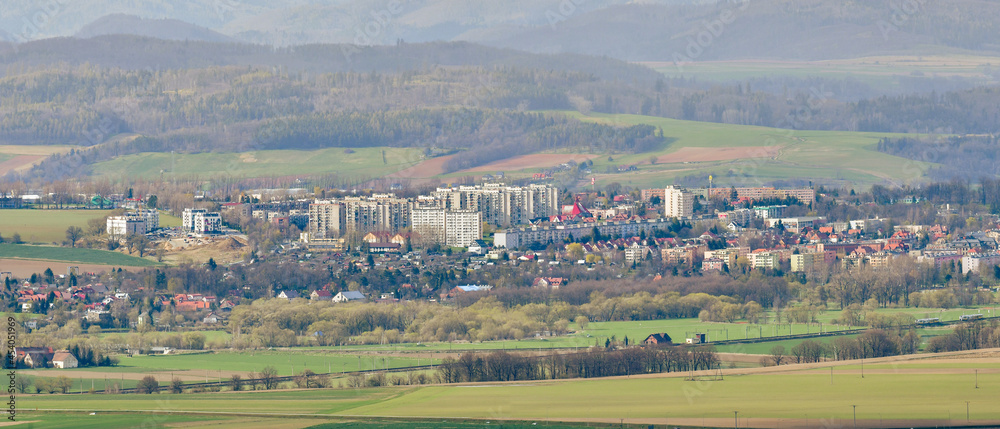 Panorama of the town of Klodzko with the Bardzkie Mountains in the background, view from a nearby hill.