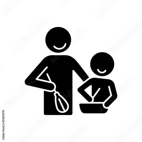 Cooking with kid black glyph icon. Creating family tradition. Preparing food together. Spend time with child. Cooking class. Silhouette symbol on white space. Vector isolated illustration