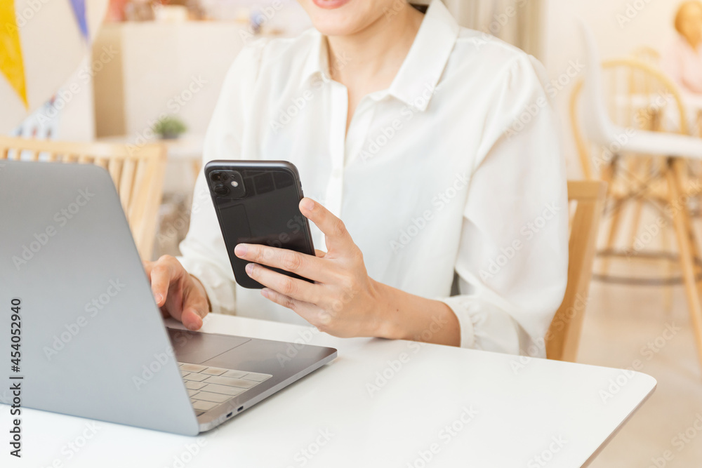 woman work using texting cell phone typing computer.student study education online learning.adult professional chatting on laptop,mobile contact us at Thinking business plan.connecting people concept. woman work using texting cell phone typing computer.student study education online learning.adult professional chatting on laptop,mobile contact us at Thinking business plan.connecting people concept.