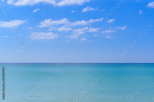 Calm Sea and Blue Sky Background.