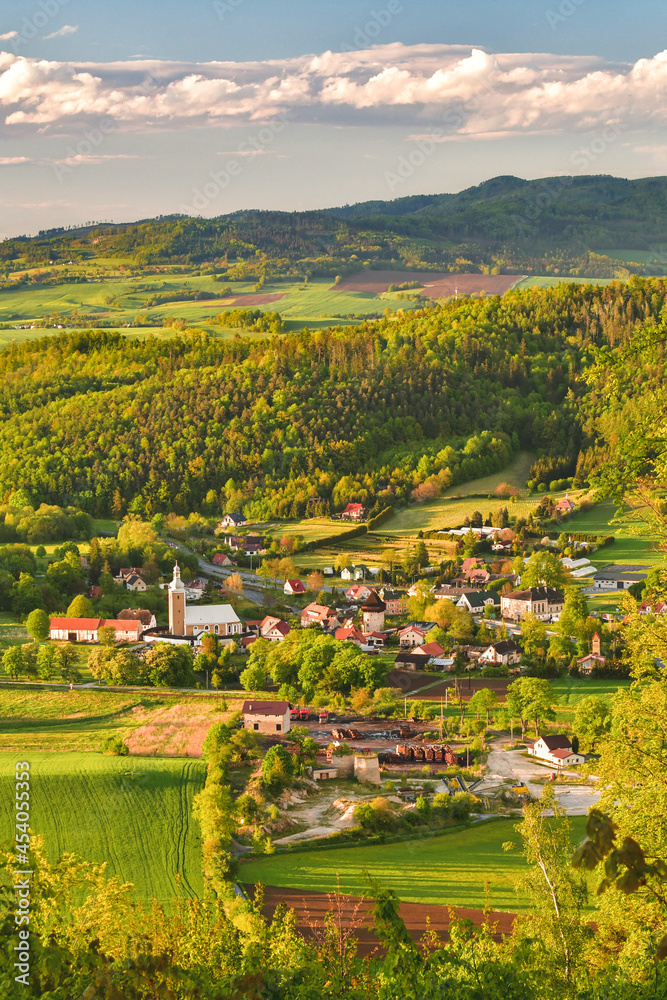 The village of Zelazno in a mountain valley, view from the top of the Wapniarka mountain before sunset.