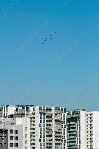 airplane flying over the city