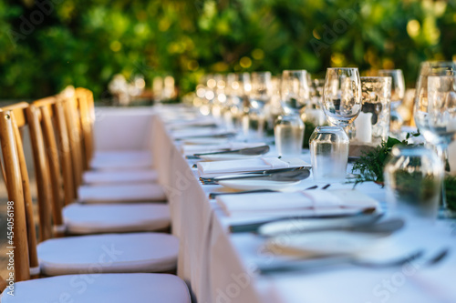 Table setting at a luxury wedding and Beautiful flowers on the table.