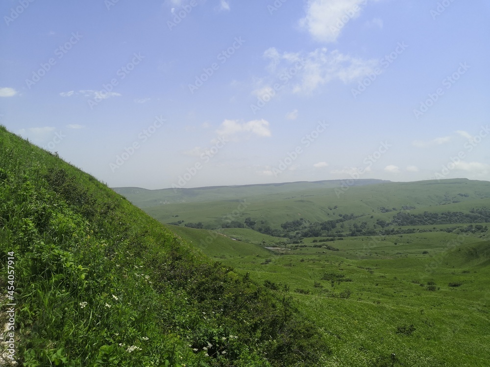 Fototapeta premium landscape with hills and blue sky