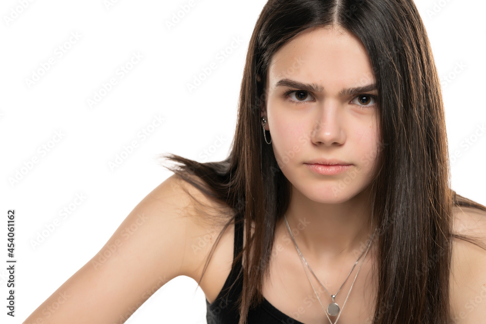 portrait of a beautifu angry teenage girl with long straight hair and no makeup portrait of a beautifu angry teenage girl with long straight hair and no makeup