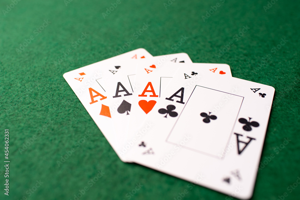 poker game. four aces on green table poker game. four aces on green table