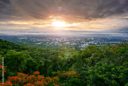 The Aerial Pan View of Chiang Mai City in cloudy day at sunrise, Thailand