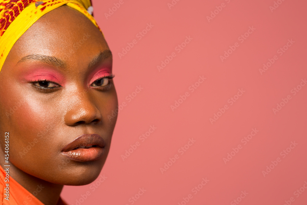 Close-up of stylish young woman wearing turban Close-up of stylish young woman wearing turban