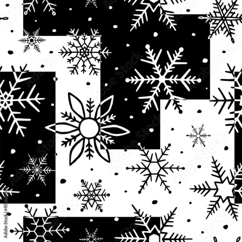 Snowflake seamless pattern. Snowflakes background. Winter design for prints. Repetition handdrawn snow printed. Hand drawn patern. Repeating black and white texture printing. Vector illustration photo