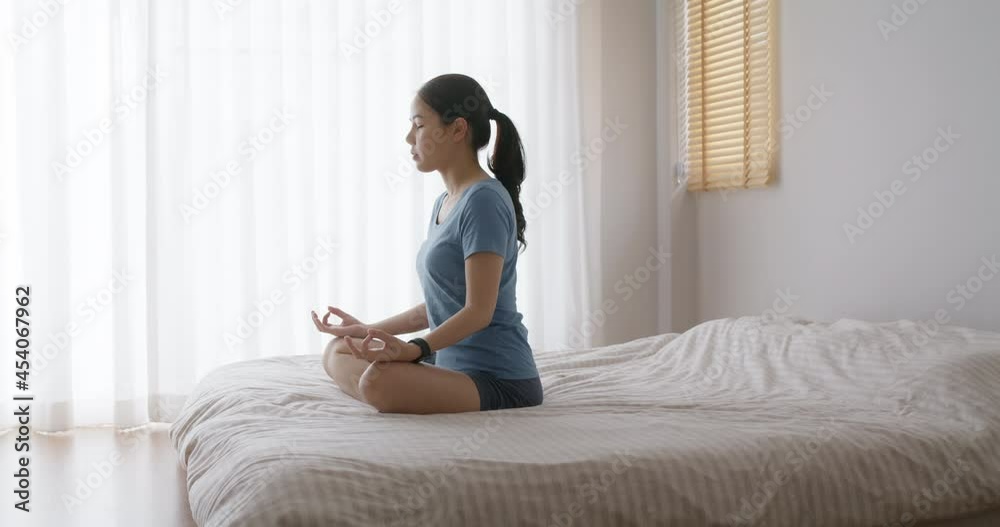 Asia serene people asana sit resting on cozy bed deep calm in zen body fresh in lady peace life at indoor home. Girl enjoy hobby in good time warm praying pose for mental relax inhale happy sport. Asia serene people asana sit resting on cozy bed deep calm in zen body fresh in lady peace life at indoor home. Girl enjoy hobby in good time warm praying pose for mental relax inhale happy sport.