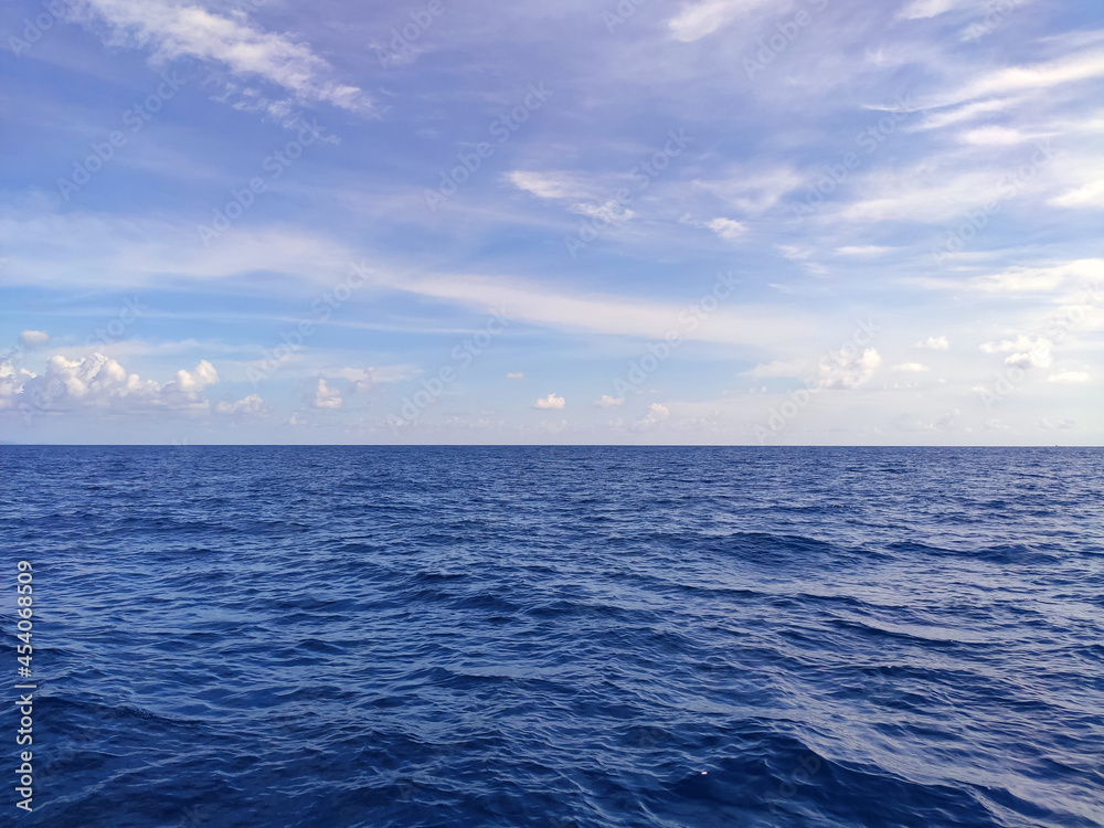 Obraz premium Calm Sea and Blue Sky Background.