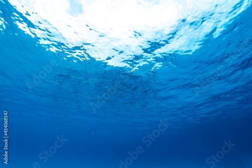 Underwater of tropical  sun rays passing through water.