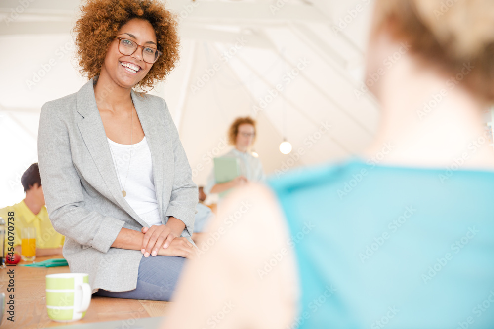 Obraz premium Portrait of young woman smiling at office
