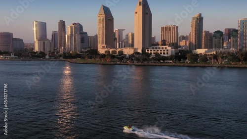 Aerial: San Diego City skyline and jet ski, California, USA photo