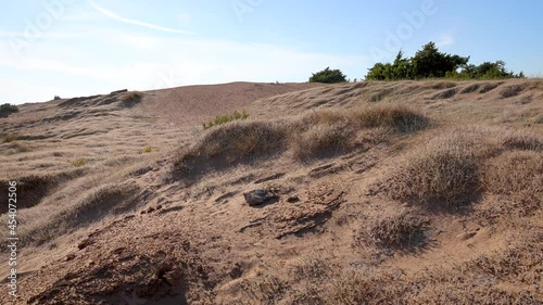 Dunes of Halikounas Beach over Korission coastal lagoon located in the southern part of the Greek island of Corfu, in the Ionian Sea, 4k video photo