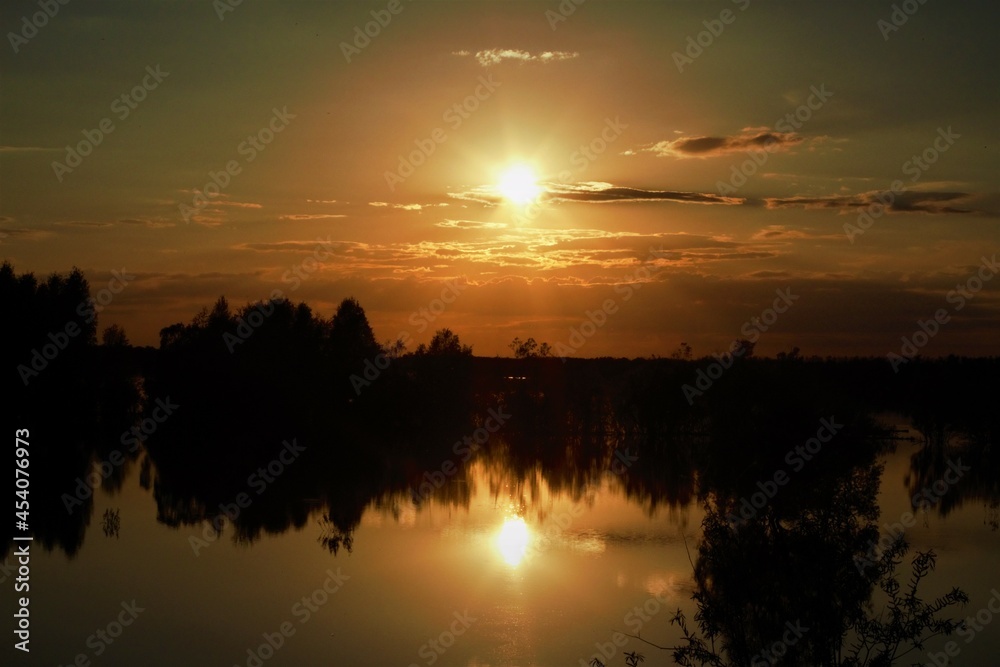 Fototapeta premium sunset over the river
