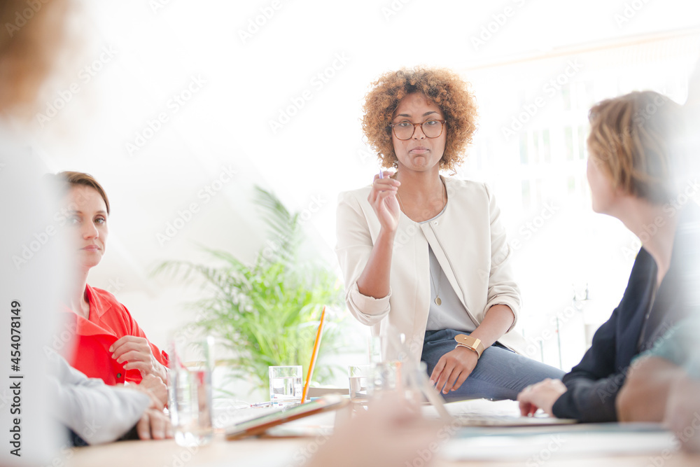 Fototapeta premium Office workers talking at desk