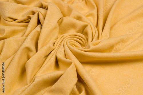 Texture of the fabric swirling in a whirlpool.  cloth background. Web article template. Long header banner format. Sale coupon. Visit card. Your information. Text space.