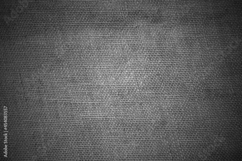 Rustikaler Hintergrund aus Stoff in schwarz grau