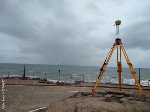 Land surveying equipment on the beach, vizhinjam Harbor Thiruvananthapuram Kerala