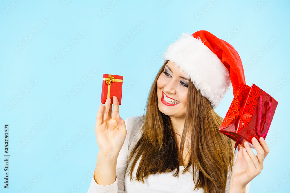Happy Christmas woman holds red gift box Happy Christmas woman holds red gift box
