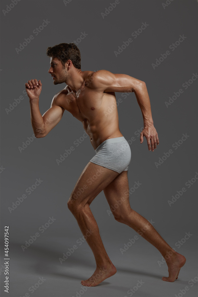 Obraz premium Young european man with naked sportive torso