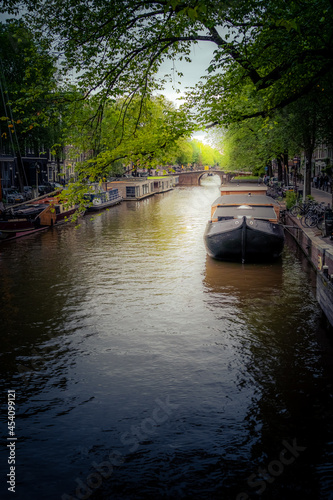 Dutch canals in Amsterdam on a warm summer afternoon