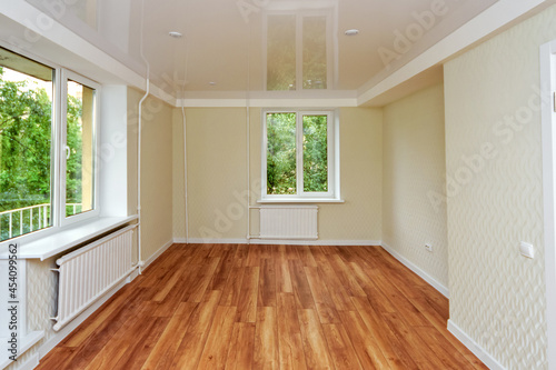 Wallpaper Mural Empty bright room with a wooden floor and light wallpaper. The apartment is after renovation. Torontodigital.ca