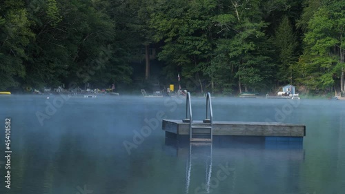 Mist on Lake Petonia near Greene, New York.  Enjoy swirling mist on a small lake in the early morning. photo