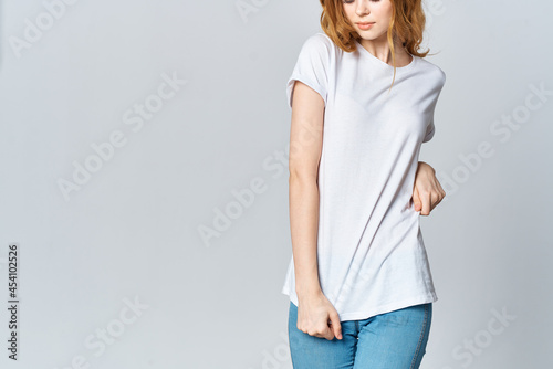 woman in white t-shirt and jeans cropped view posing mocap