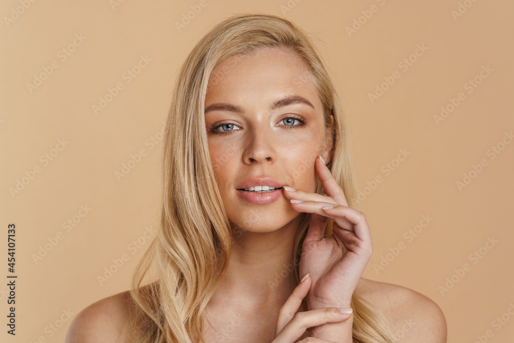 Beauty image of a smiling young blonde woman Beauty image of a smiling young blonde woman