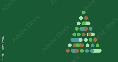 Digital Christmas tree against green background