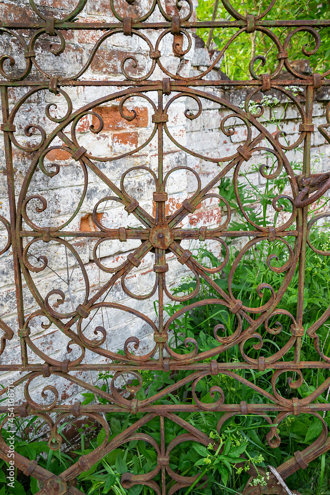 antique, rusty, shaped metal grating