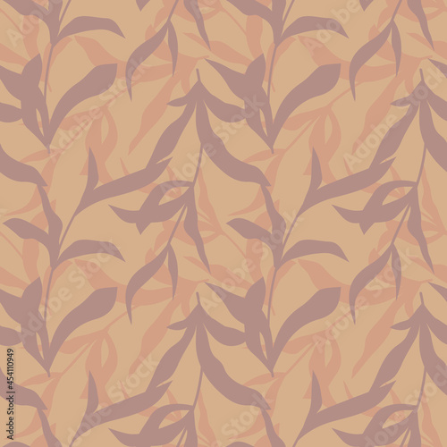 Vector seamless pattern of autumn leaf branches on the beige background. 