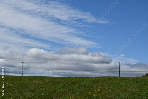 A field under a blue sky, Sainte-Apolline, Québec, Canada