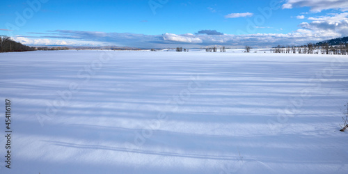 Winter landscape with the snowy field in eastern Oregon. © thecolorpixels