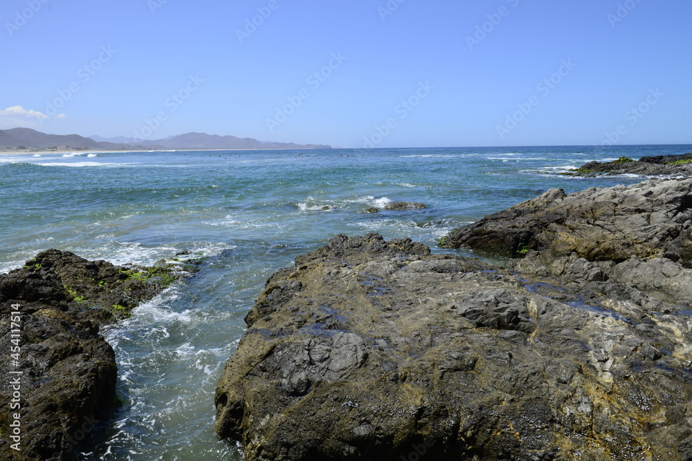 Rocks and ocean waves at the pacific ocean near Todos Santos in the Baja peninsula at Baja california Sur, La Paz Todos Santos Mexico. LOS CERRITOS Beach 