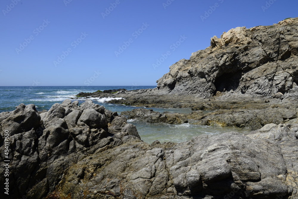 Rocks and ocean waves at the pacific ocean near Todos Santos in the Baja peninsula at Baja california Sur, La Paz Todos Santos Mexico. LOS CERRITOS Beach 