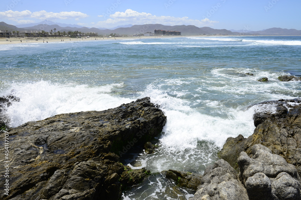 Rocks and ocean waves at the pacific ocean near Todos Santos in the Baja peninsula at Baja california Sur, La Paz Todos Santos Mexico. LOS CERRITOS Beach 