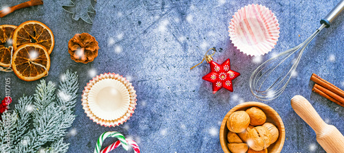 Christmas recipe food baking banner. Baking ingredients background, dishes, whisk, rolling pin, cookie cuttings, nuts, spices, top view, copy space, flat lay. Christmas baking concept