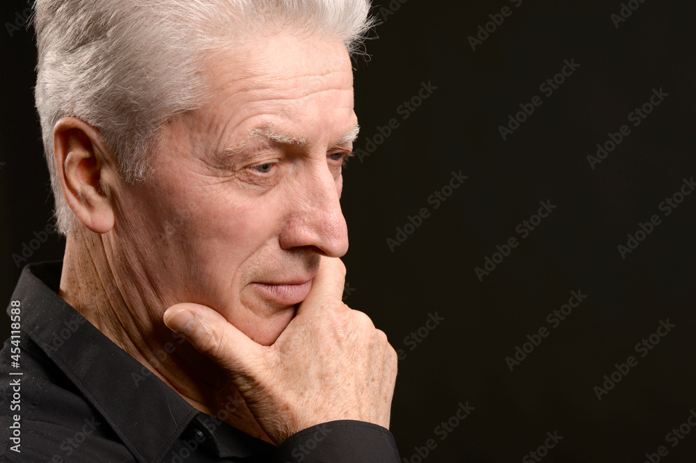 Close up portrait of thoughtful senior man Close up portrait of thoughtful senior man