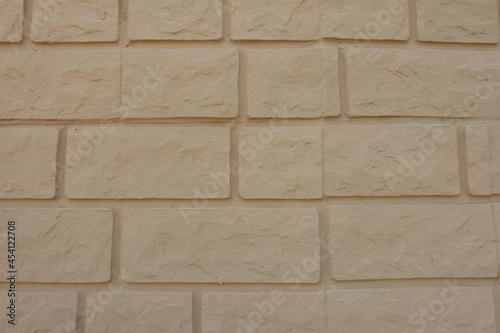 Common bond wall made of pale yellow brick veneers