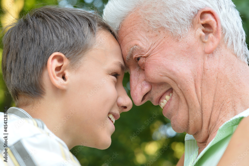 Close up portrait of happy grandfather and grandson Close up portrait of happy grandfather and grandson
